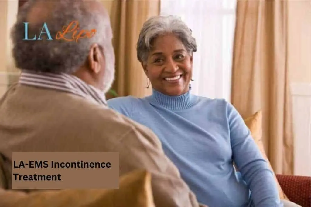 Couple sat smiling at each other - LA-EMS treatment Ashford
