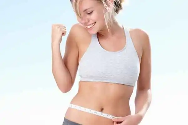 woman happy after fat reduction treatment Ashford